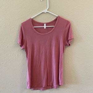 Pink short sleeve shirt. Size medium